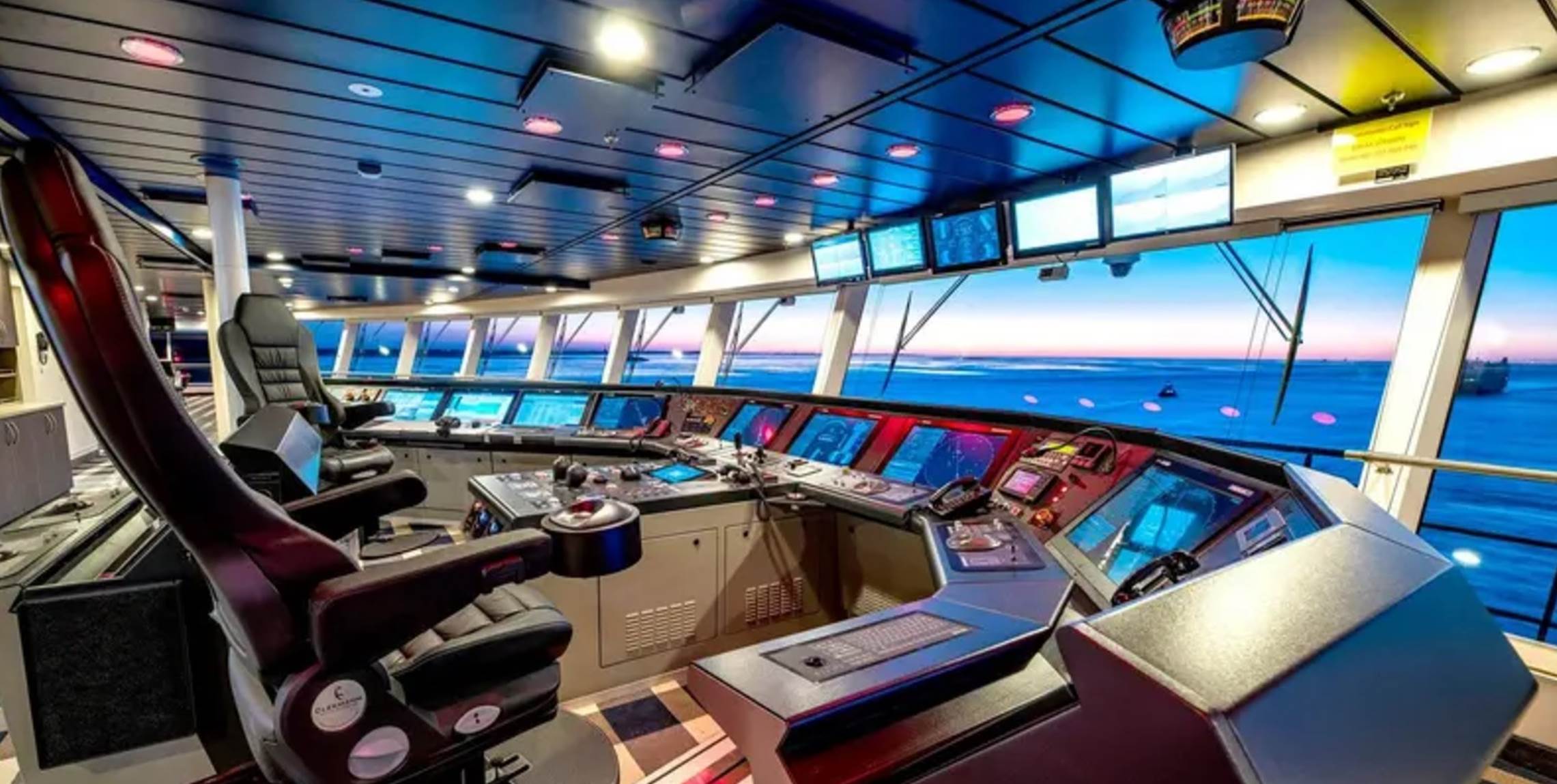 A large control room with many screens

Description automatically generated with medium confidence