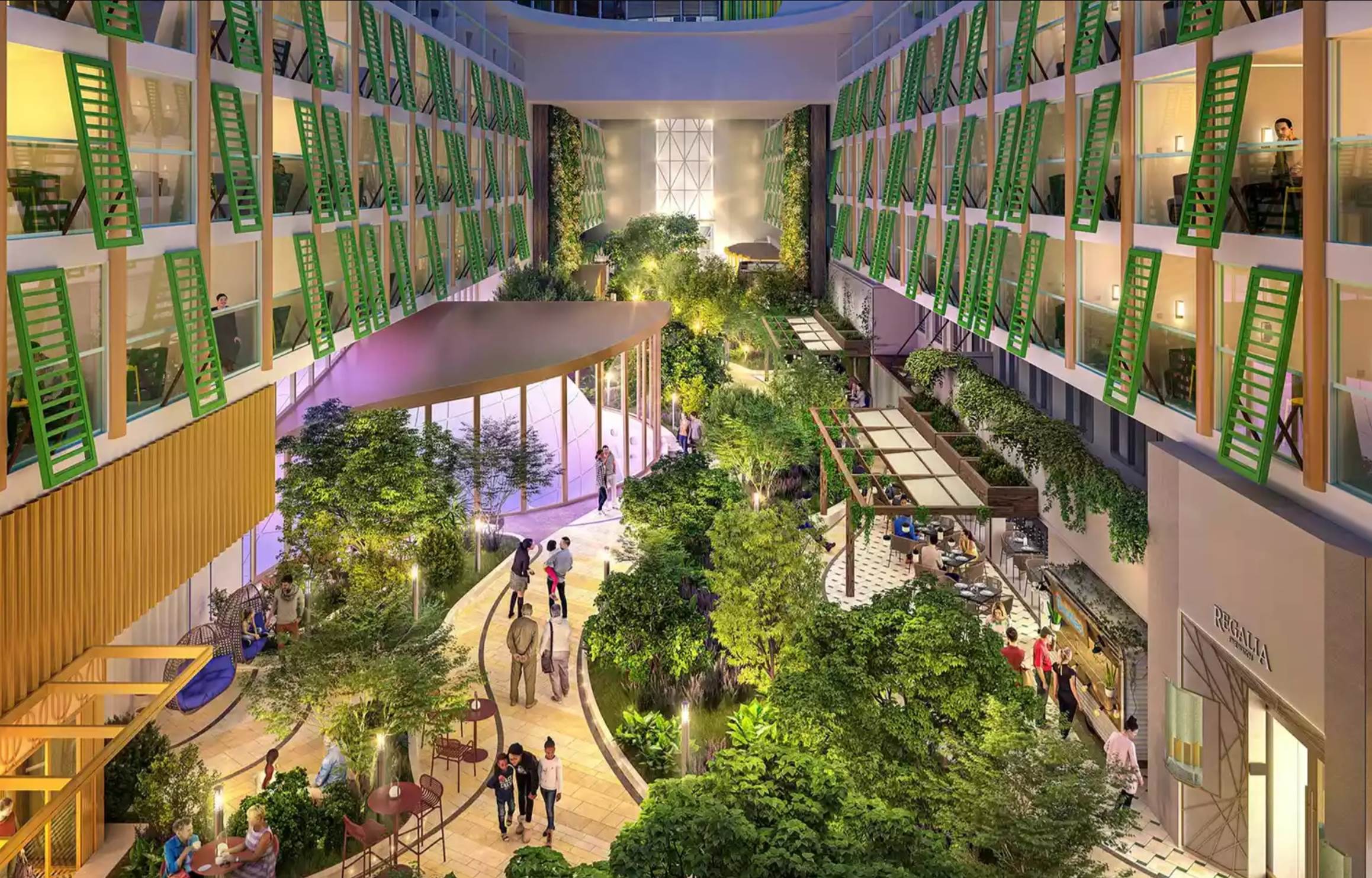 A group of people walking in a building

Description automatically generated