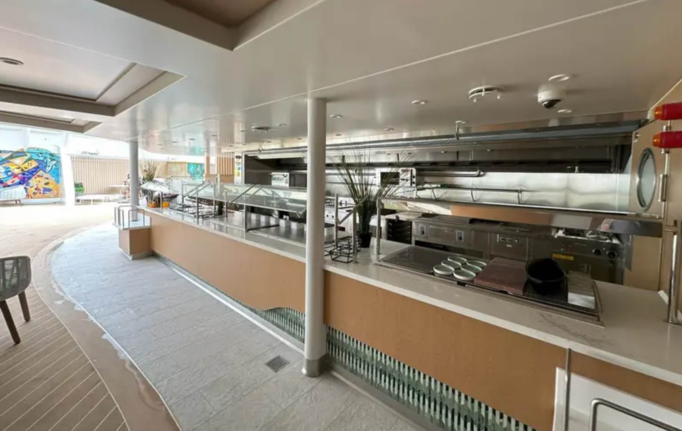 A restaurant with a buffet

Description automatically generated with medium confidence