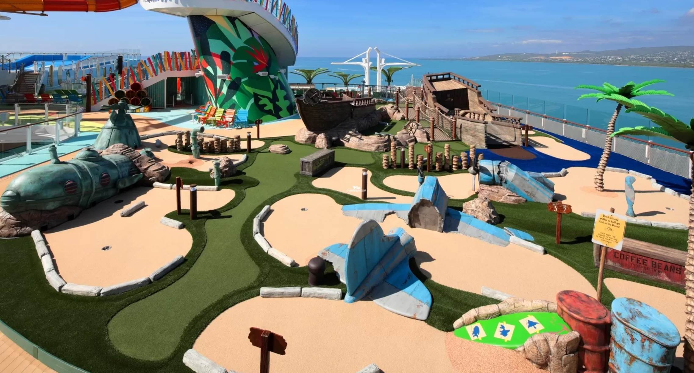 A miniature golf course on a cruise ship

Description automatically generated